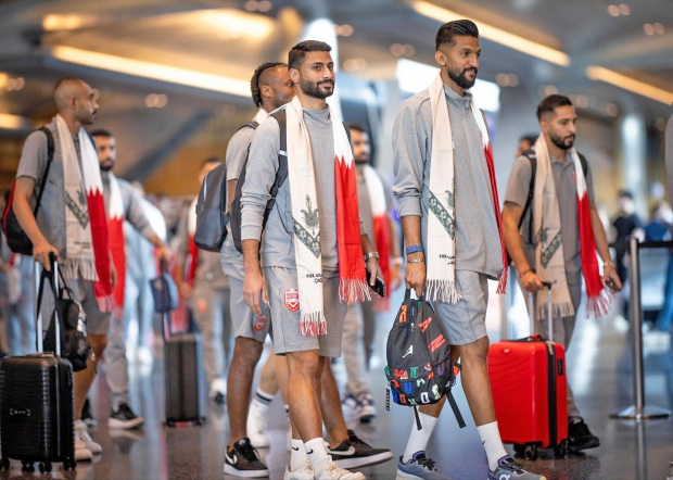Football team arrive in Doha